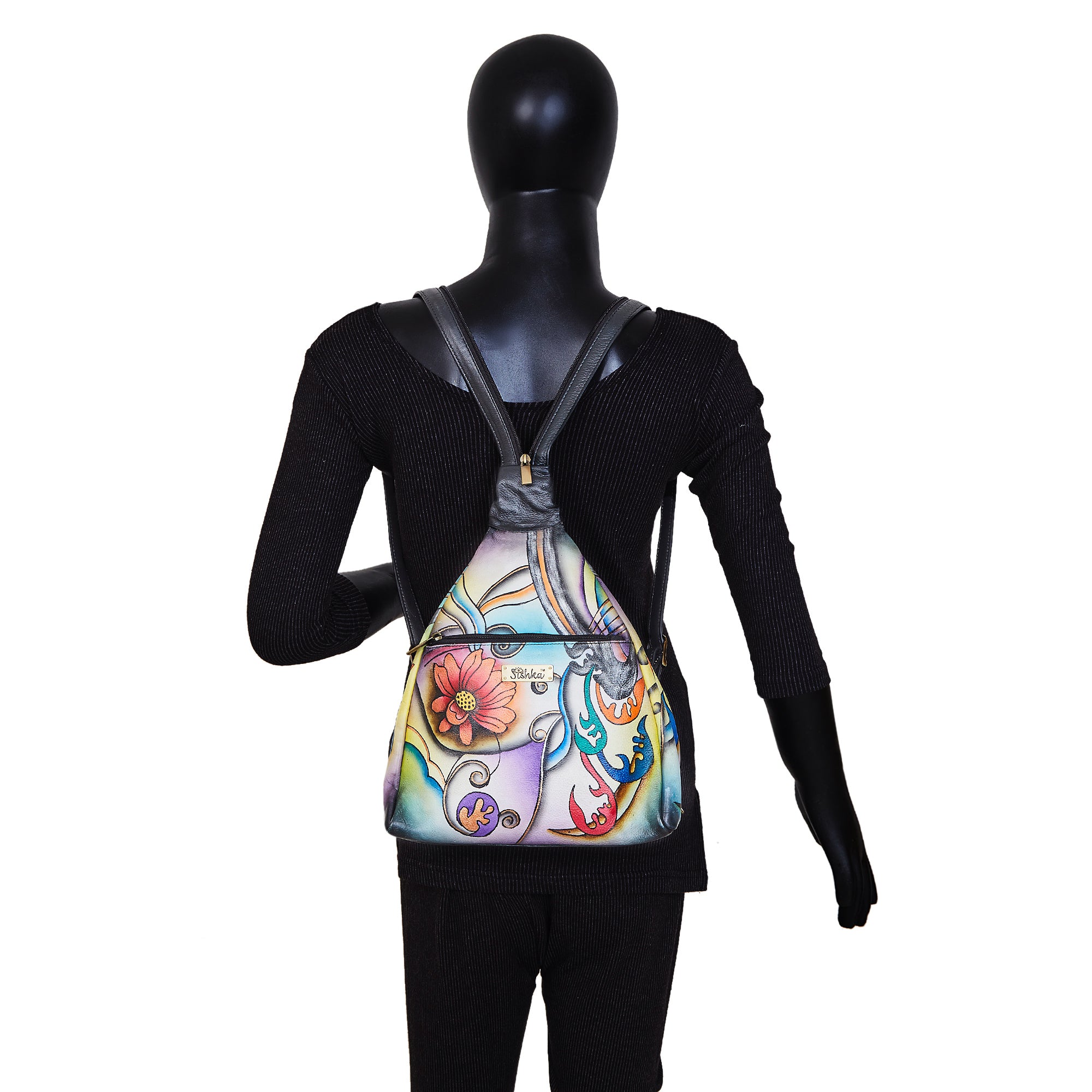 Convertible leather backpack with a hand-painted floral motif